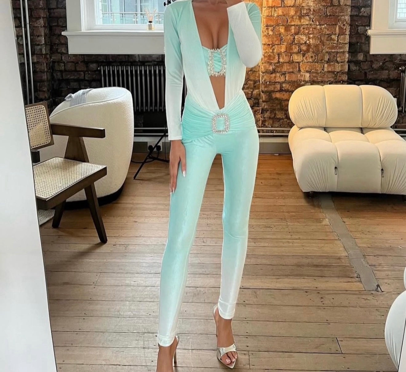 Metallic aqua cut out jumpsuit with crystal buckle detailing